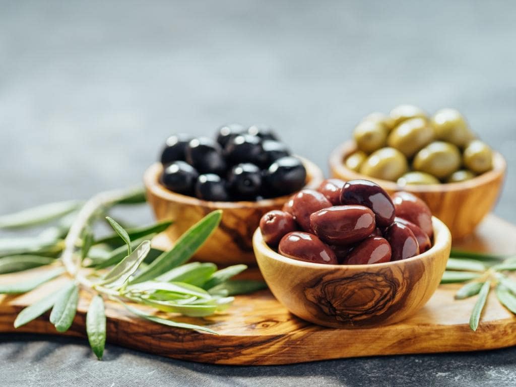 Olives in wooden bowl